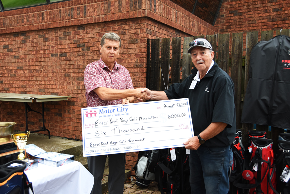 MARTIN PRESENTING $6,000 TO THE ESSEX-KENT BOYS GOLF ASSOCIATION